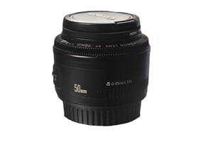Canon 50mm f/1.8 camera lens in leather pouch