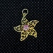 14K Gold Flower Pendant with 0.30ct Fancy Pink Diamond 